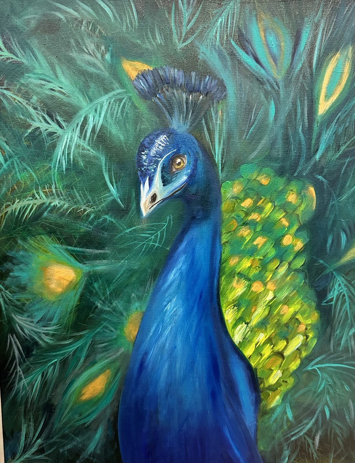 A cobalt peacock looks over its shoulder against dark teal tail feathers with ochre eyespots.
